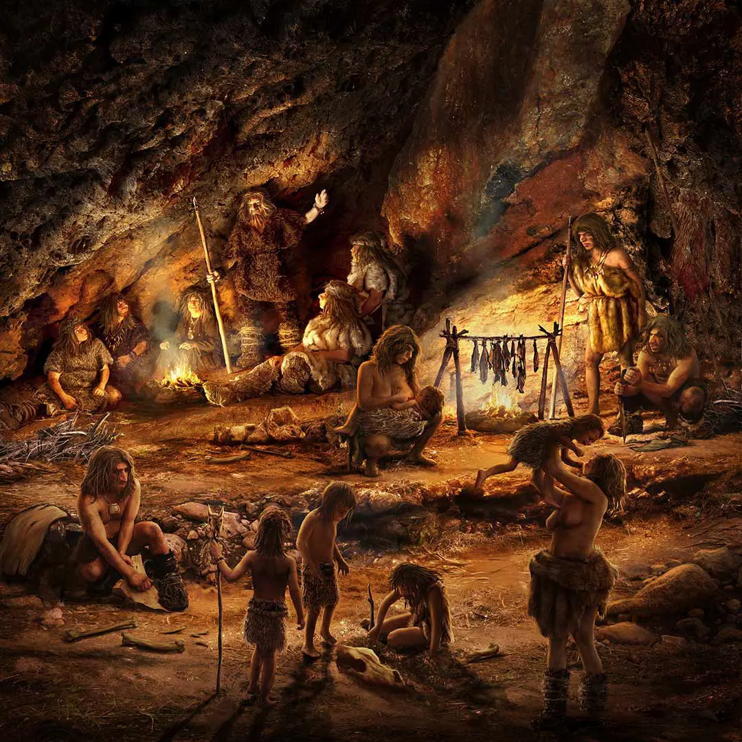 Humanos primitivos ao redor de fogueiras